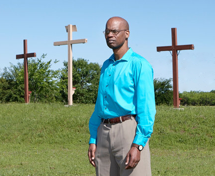 Yancey in front of crosses